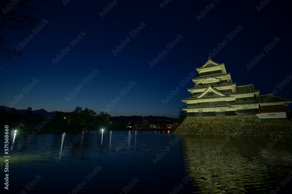 The historic Matsumoto Castle at Night in Japan The historic Matsumoto Castle at Night in Japan