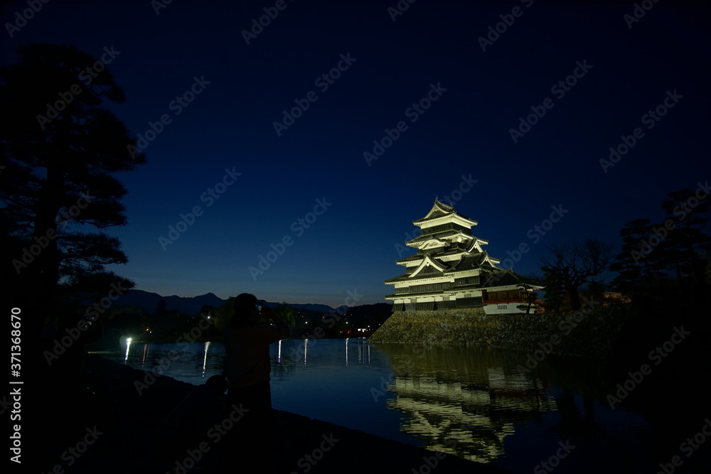 The historic Matsumoto Castle at Night in Japan The historic Matsumoto Castle at Night in Japan