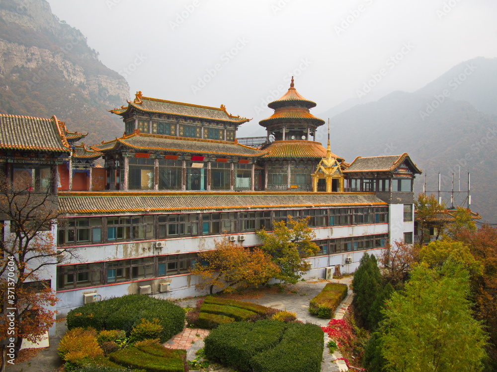 Obraz premium Mianshan Mountain the World Heritage Site, Many of Ancient Hanging Taoist Temples and caves. Pingyao Ancient City, Shanxi Province, China. 18th October 2018.