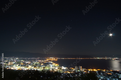 Night view of the city of Suwa lake in Nagano, Japan