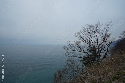 Beautiful landscape with sea coast in summer cloudy day
