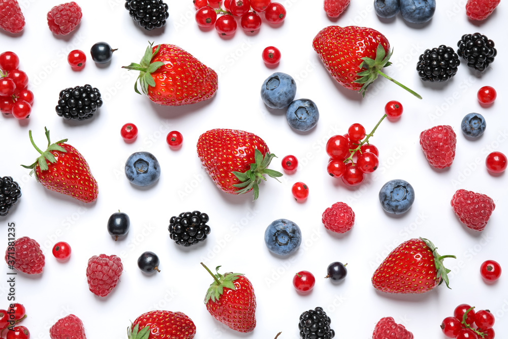 Mix of fresh berries on white background, flat lay Mix of fresh berries on white background, flat lay
