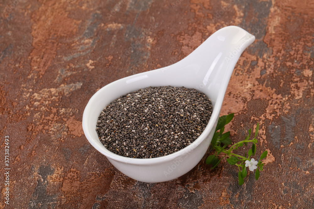 Dietary Chia seeds in the bowl Dietary Chia seeds in the bowl