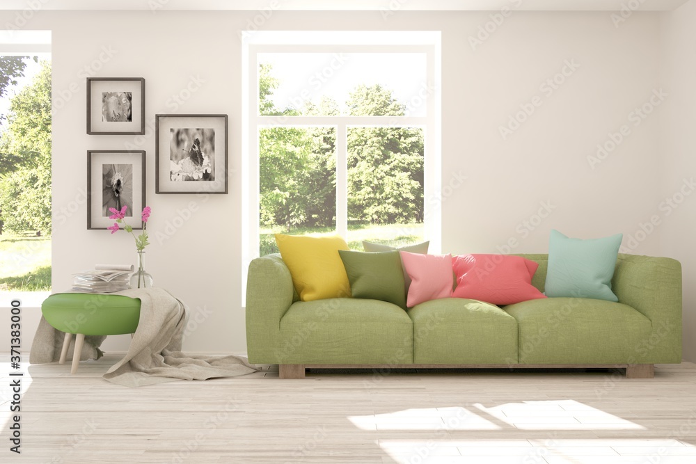 Obraz premium White stylish minimalist room with sofa and summer landscape in window. Scandinavian interior design. 3D illustration