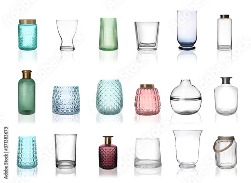 Bild auf Leinwand Set of empty glass vases on white background