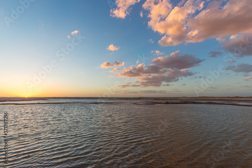 Sunset landscape of salt lakes Ala Shan Desert or Tengger Desert, Inner Mongolia, Northwest of China photo