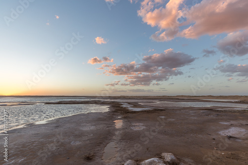 Sunset landscape of salt lakes Ala Shan Desert or Tengger Desert  Inner Mongolia  Northwest of China