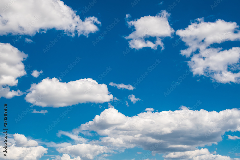 Images of a blue sky with white clouds