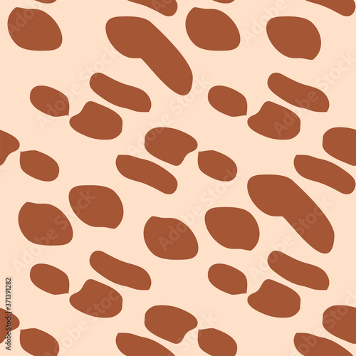 Giraffe fur seamless pattern, tropical animal skin texture.