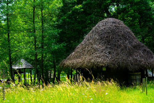 authentic and traditional house made of clay and thatched roof and wood