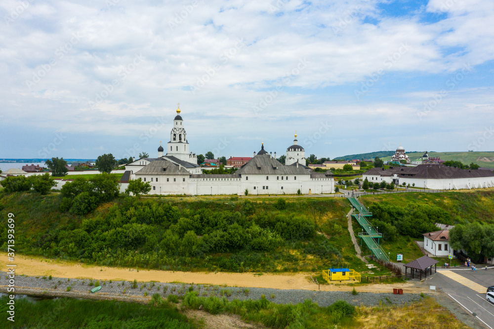 Beautiful panoramic view of the old Russian city Sviyazhsk from above The Assumption Cathedral and Monastery in the town-island of Sviyazhsk. UNESCO world heritage in Russia