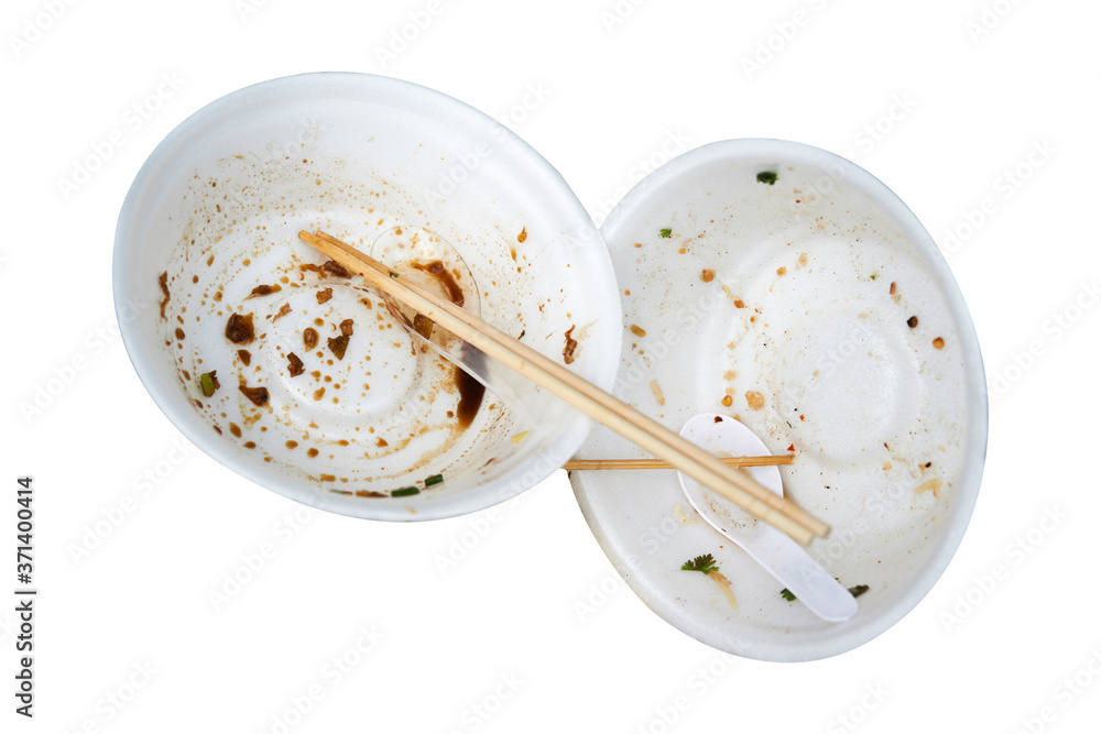 Dirty foam bowls with plastic spoons and chopsticks isolated on white Dirty foam bowls with plastic spoons and chopsticks isolated on white