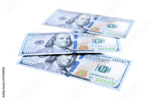 One hundred dollar banknotes stacked isolated on white background