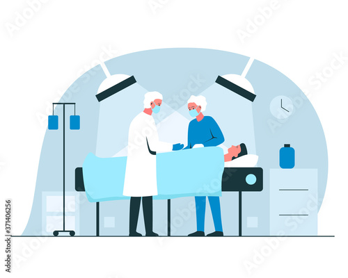 Murais de parede Male surgeon and nurse performing an operation in surgery room in a hospital