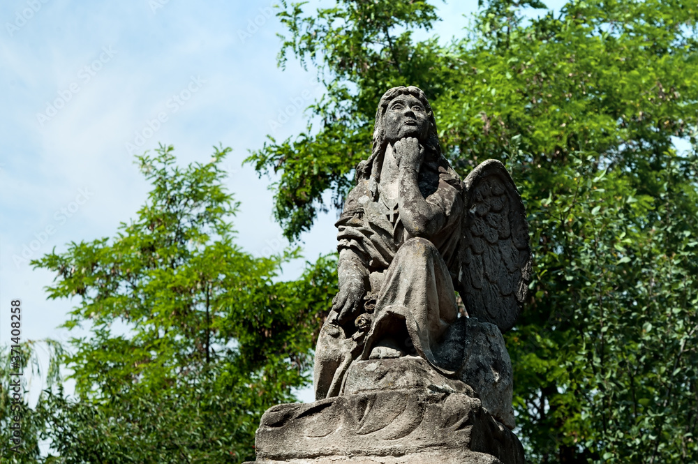 Angel statue in a park in Kamianets-Podilskyi, Ukraine.