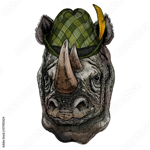 Rhinoceros, rhino portrait. Austrian bavarian tirol hat. Beer festival. Oktoberfest. Head of wild animal.