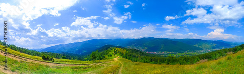 Fototapeta Naklejka Na Ścianę i Meble -  Panorama view of mountains. Beautiful landscape. Sky with clouds. Amazing nature. Wanderlust concept.