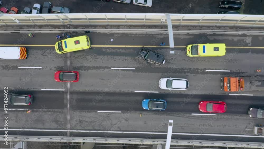road junction, car accident, ambulance on the road, top view from drone road junction, car accident, ambulance on the road, top view from drone