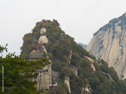 Huashan Mountain near Xian City. The Most dangerous Trail and Crowned People in China. Mount Hua is one of the Five Great Mountains of China in Huayin City, Shaanxi Province, China, 18th October 2018 photo