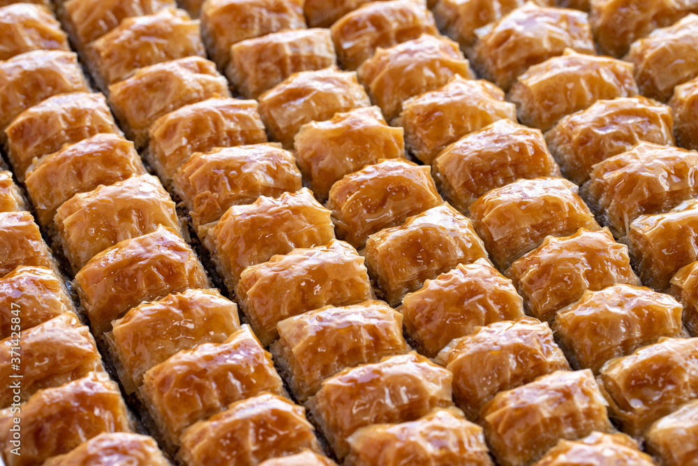 Baklava with walnut standing on the tray