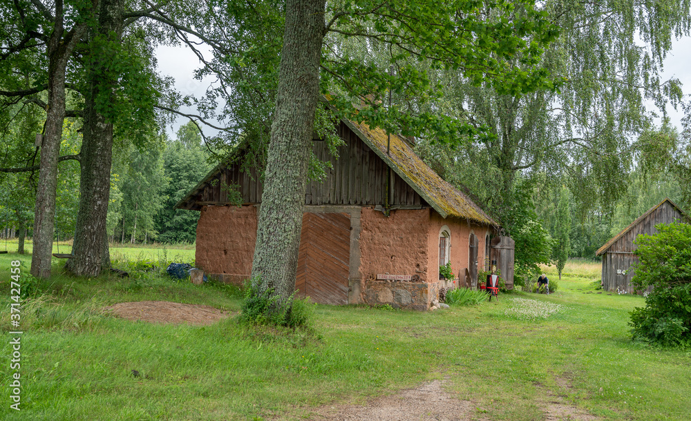 old house in estonian village old house in estonian village