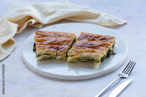 spinach pie on a white background