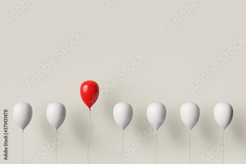 Roter Ballon fliegt hoch als Individualität Konzept