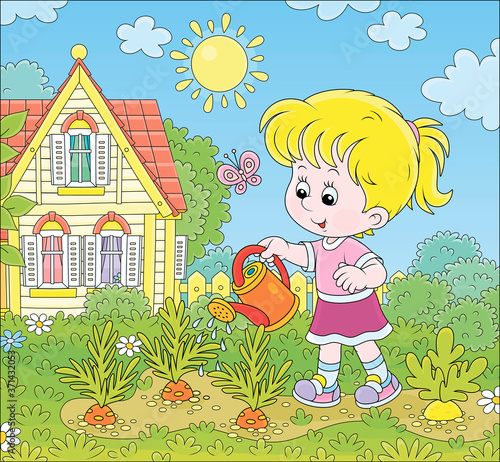 Smiling little girl waterin...