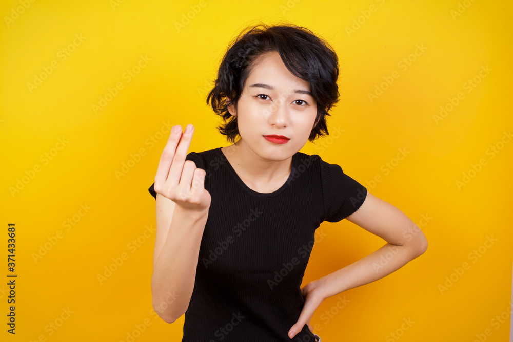 What the hell are you talking about. Shot of frustrated young European woman gesturing with raised hand doing Italian gesture, frowning, being displeased and confused with dumb question. What the hell are you talking about. Shot of frustrated young European woman gesturing with raised hand doing Italian gesture, frowning, being displeased and confused with dumb question.