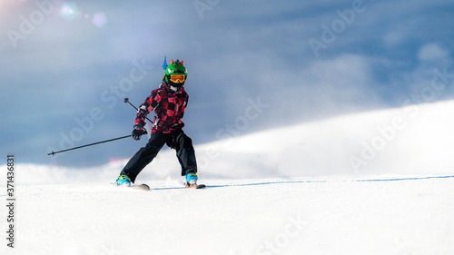 Portrait of boy skier on the mountain