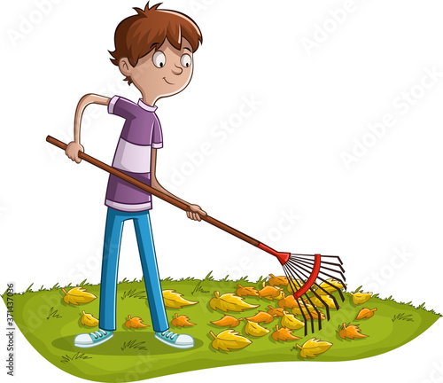 Boys raking fallen leaves in the garden. Teenager working in the garden with rake.
