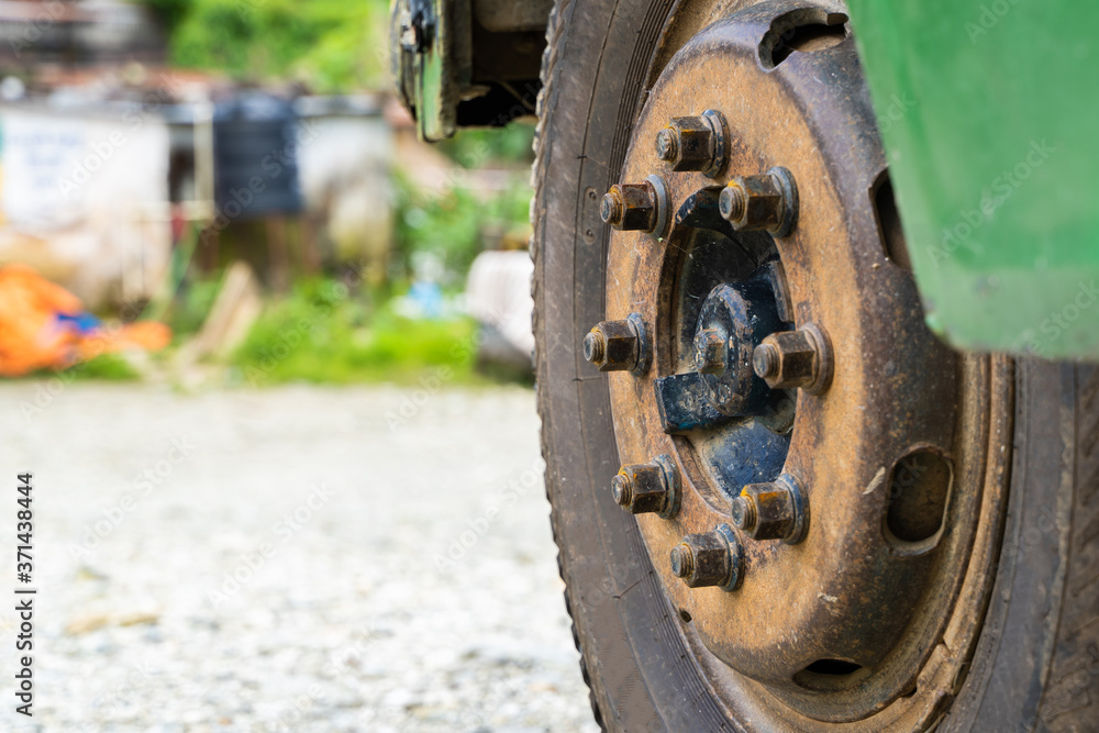Close up photo of bus or truck front wheel Close up photo of bus or truck front wheel
