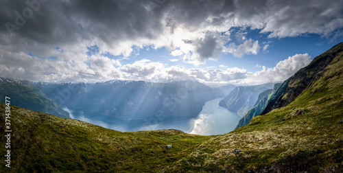 Aurlandsfjord panorama in glorious sunshine at a cloudy day Norway