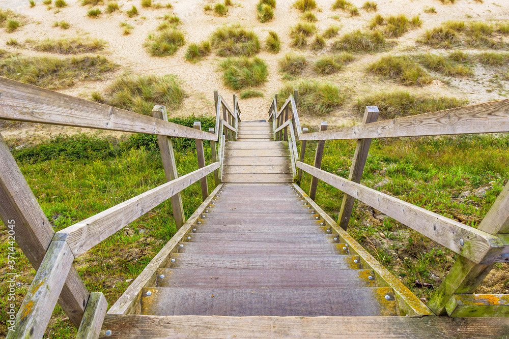 wooden steps heading down over the beach and sand dunes at Lowestoft Suffolk