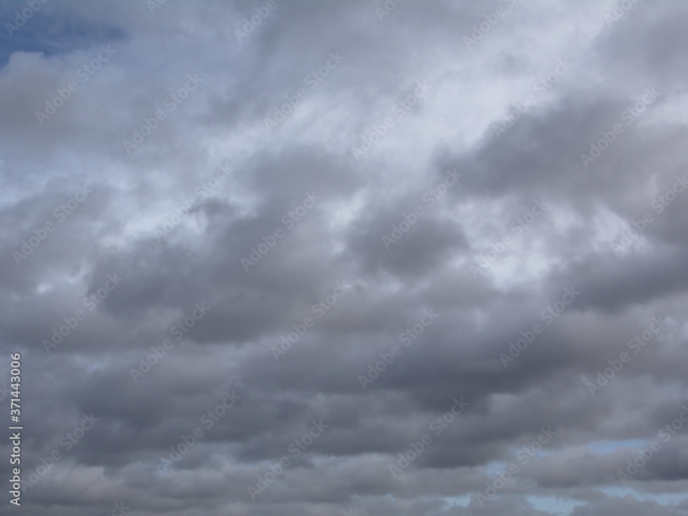 Dark grey storm clouds bckground