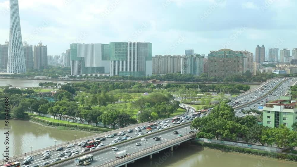 magnificent view of Guangzhou (Canton), along Pearl River, Guangdong, China (Guangzhou tower and traffic crossing Guangzhou Bridge) magnificent view of Guangzhou (Canton), along Pearl River, Guangdong, China (Guangzhou tower and traffic crossing Guangzhou Bridge)