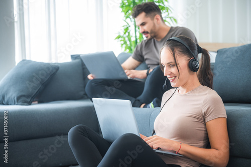 business work from home concept, young couple working with laptop at home © chokniti