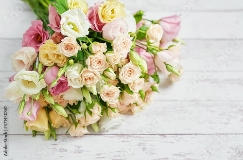 Flowers for women's day. Mother's day greeting card. Bouquet of flowers eustoma and roses in vase. Happy Birthday! Valentine's day gift. 14 February. I love you concept. Flower delivery. Flower shop