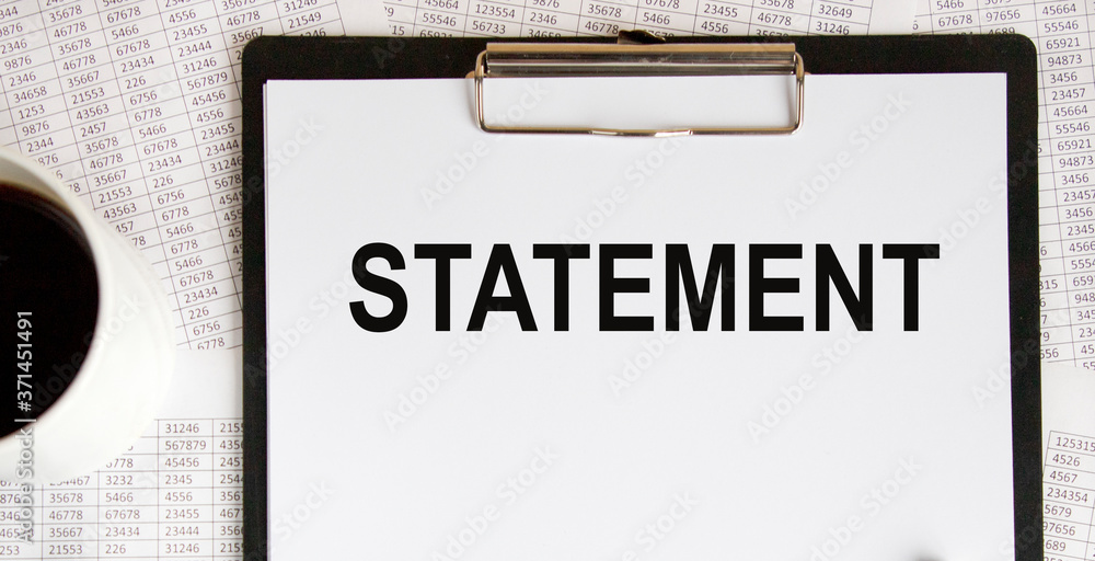 STATEMENTS word made with wood building blocks. STATEMENTS word made with wood building blocks.