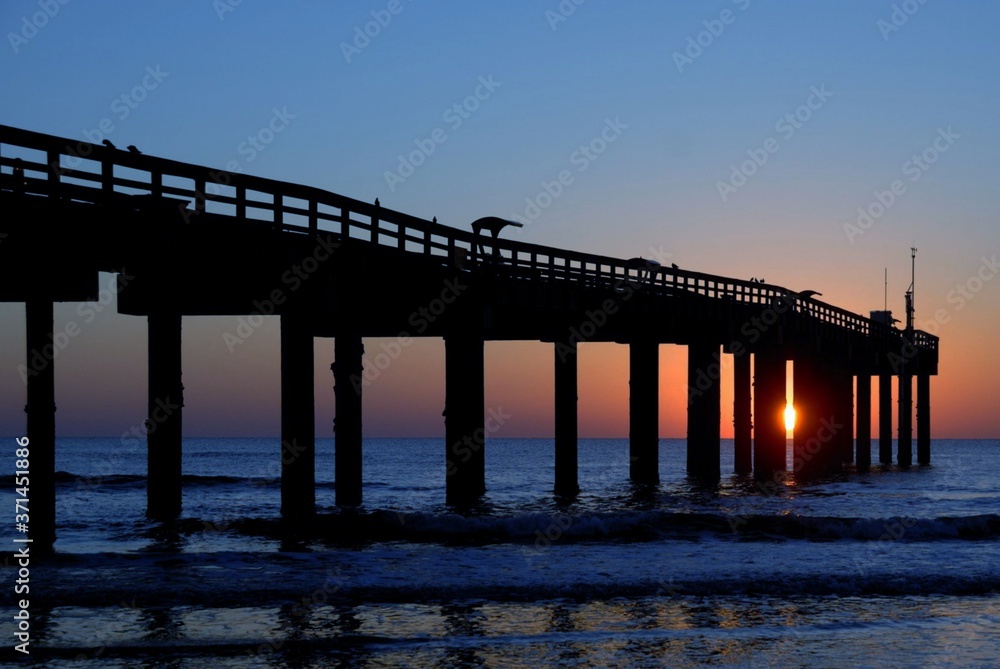 A long bridge over a body of water A long bridge over a body of water