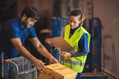Male warehouse worker worki...