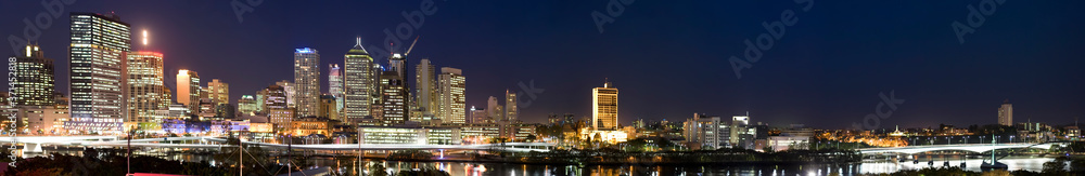 A wide panorama shot of Brisbane city at night