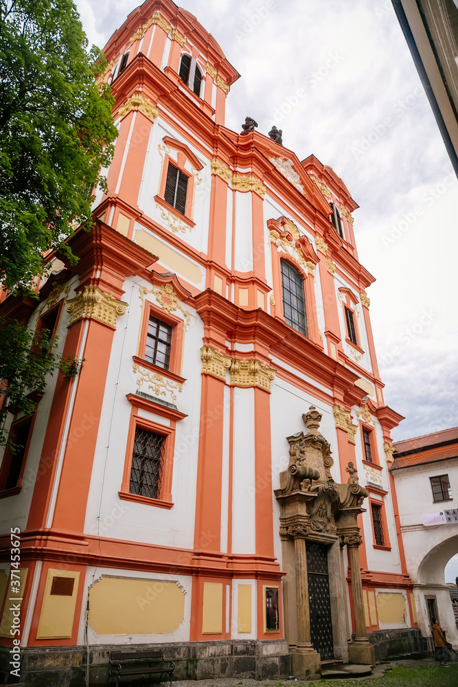 Baroque red and white Jesuit Church of the Annunciation, Litomerice, Czech Republic