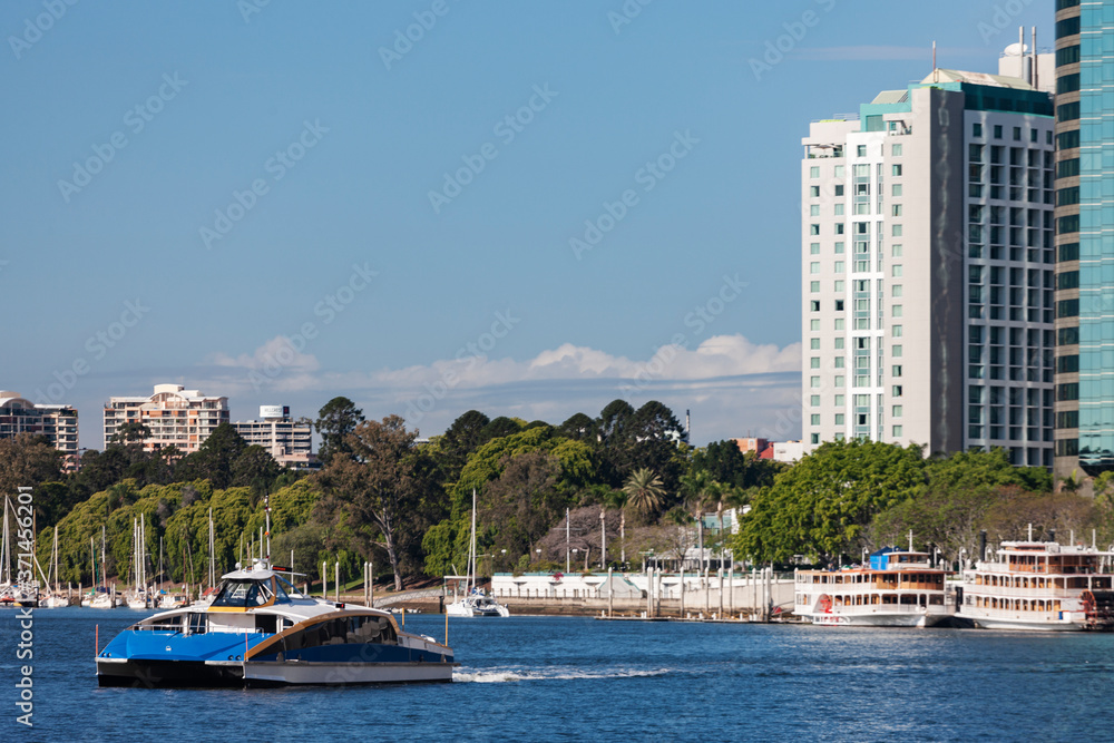 A city ferry sailing on Brisbane river