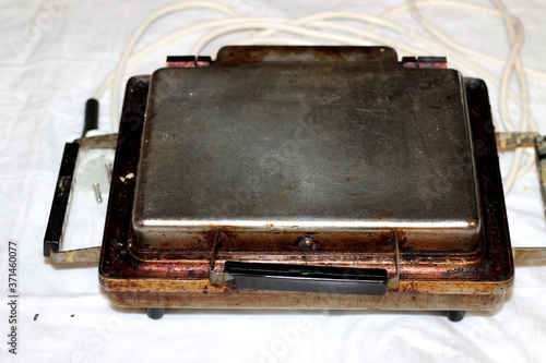 Wallpaper Mural 
Vintage cast iron waffle iron. Torontodigital.ca