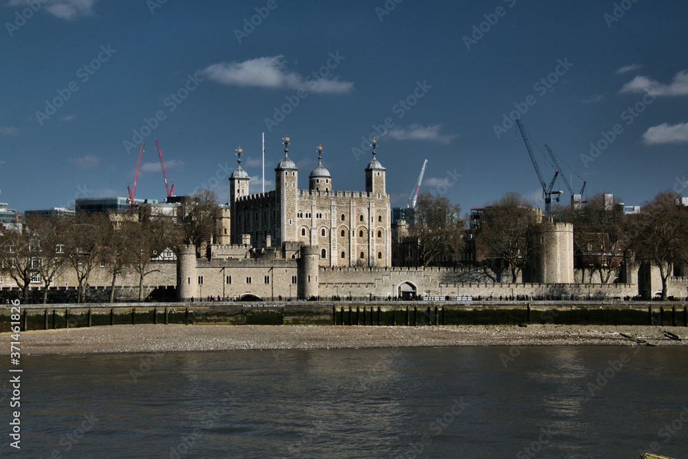 A view of the Tower of London across the river Thames
