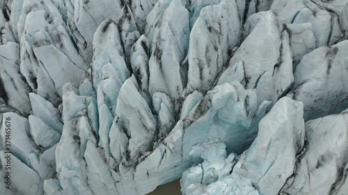 Wallpaper Mural Aerial: Close up of Largest Glacier in Europe Vatnajokull Iceland Cloudy Gloomy day. Ridges with black ash. Melting ice. Concept of global warming Torontodigital.ca