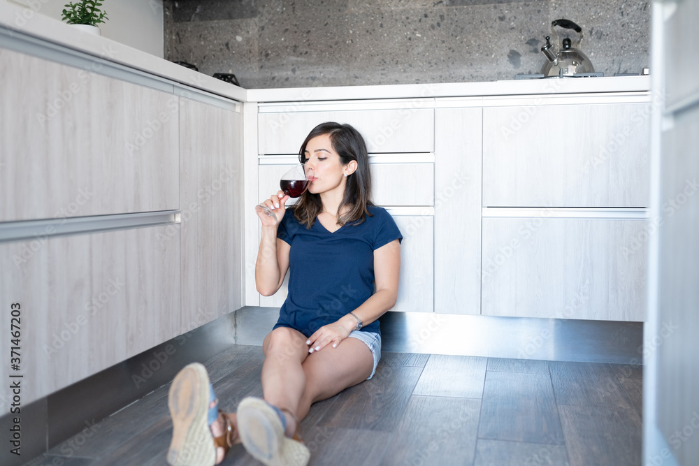 Young Woman Drinking Wine At Home Young Woman Drinking Wine At Home