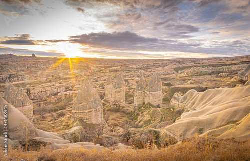 Dramatic sunrise over the scenic valley of Cappadocia from Lovers hill viewpoint. Goreme sightseeng. photo