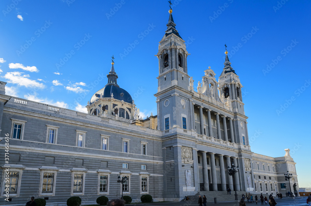 Madrid/Spain/21.23.2014.
Facade and bell towers of Cathedral of the Almudena Cathedral of Santa María la Real de la Almudena. Baroque Catholic cathedral known for its colorful chapels.